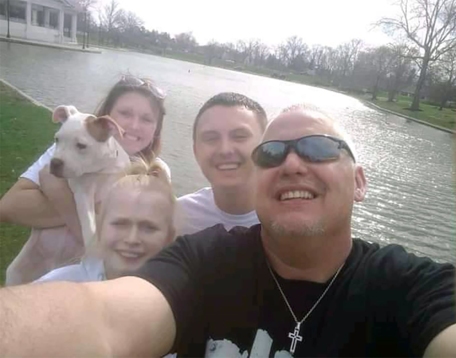 Michael Wise with three of his children, from left, Michaela (with dog), now 21, Maddie, now 17 and Christopher, now 24. Wise also has three other sons, Jonah, 14, Justin, 12 and Preston, almost 2. CONTRIBUTED
