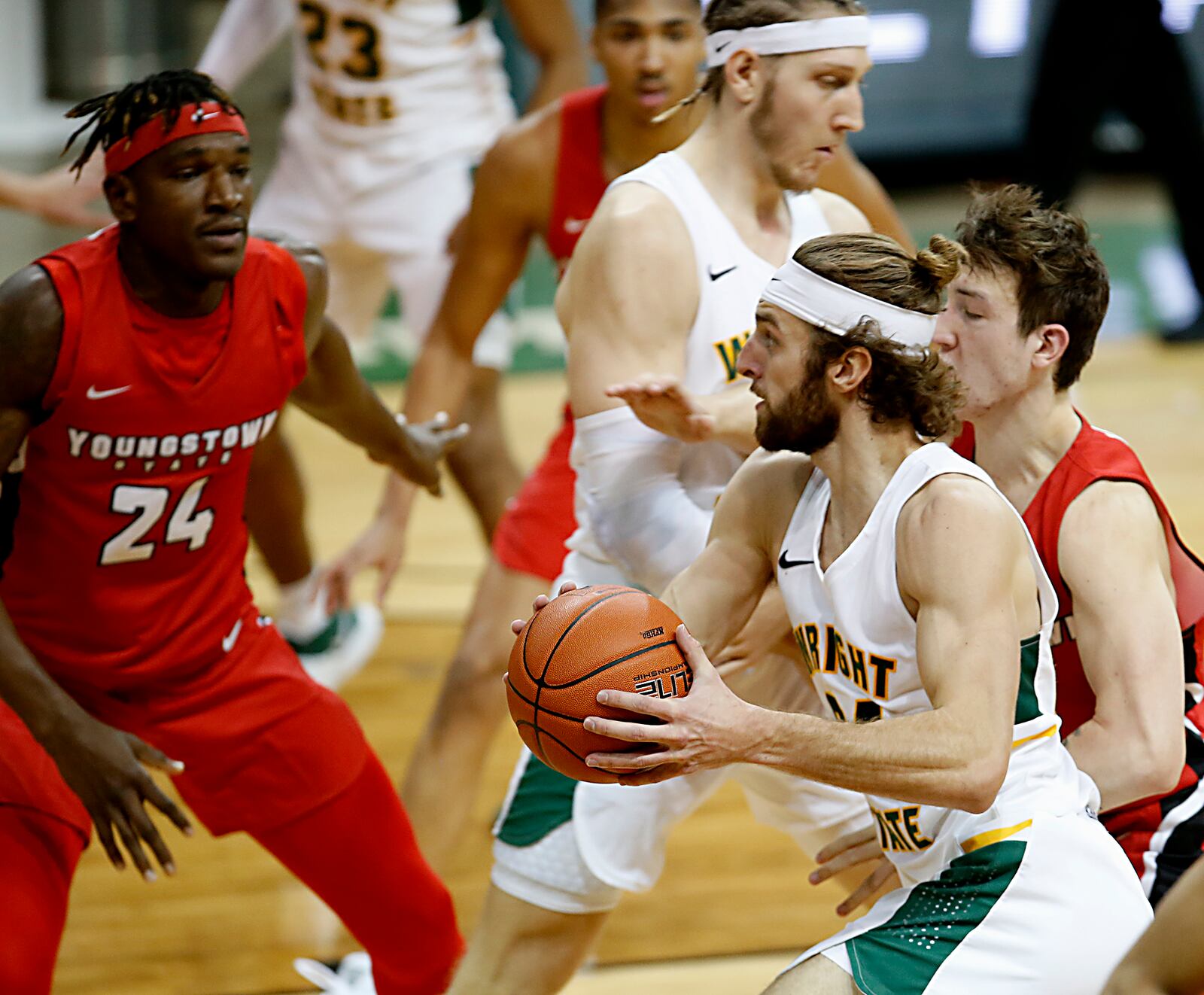 Wright State guard Tim Finke cuts through Youngstown State traffic during a Horizon League game at the Nutter Center in Fairborn Jan. 9, 2021. Wright State won 93-55. Contributed photo by E.L. Hubbard