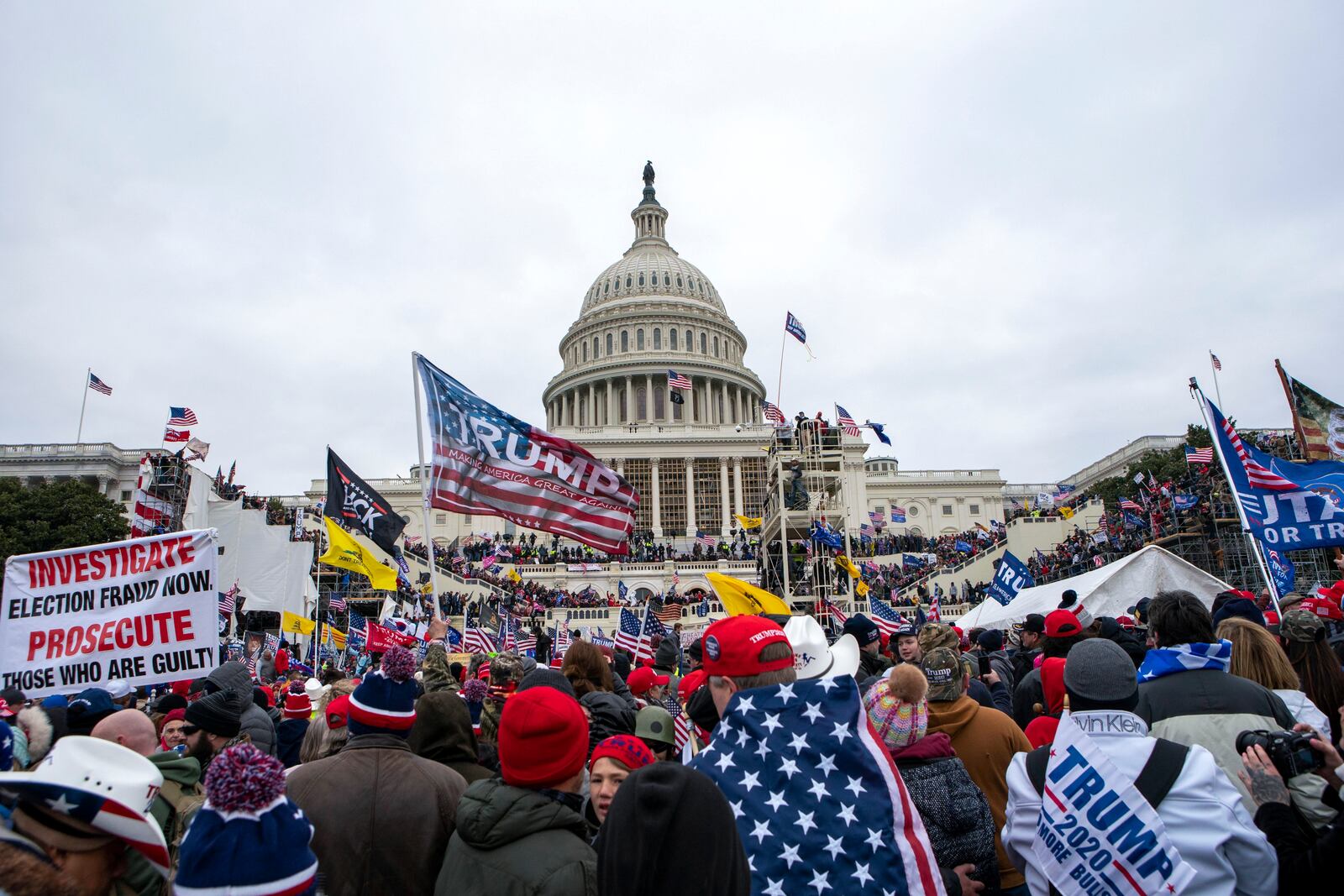 FILE - People attack the U.S. Capitol in Washington, on Jan. 6, 2021. (AP Photo/Jose Luis Magana, File)