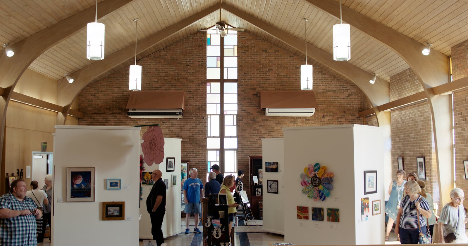 The Joy & Whimsy Depot on Dayton Street in Lewisburg is housed in a former church building. On the opening day, June 5, people walked through galleries displaying art from local and regional artists. CONTRIBUTED