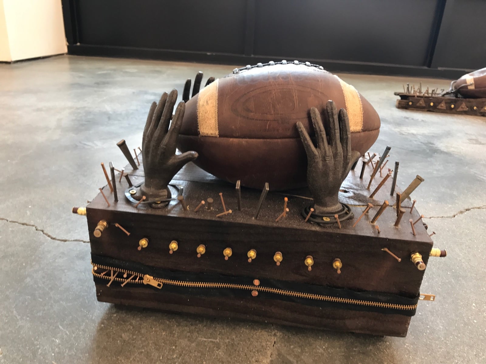 One of the kneelers in the exhibit by Bing Davis called "Kneel." It's on display through Sunday at The Contemporary Dayton gallery, 25 W. Fourth Street in downtown Dayton. Tom Archdeacon/STAFF