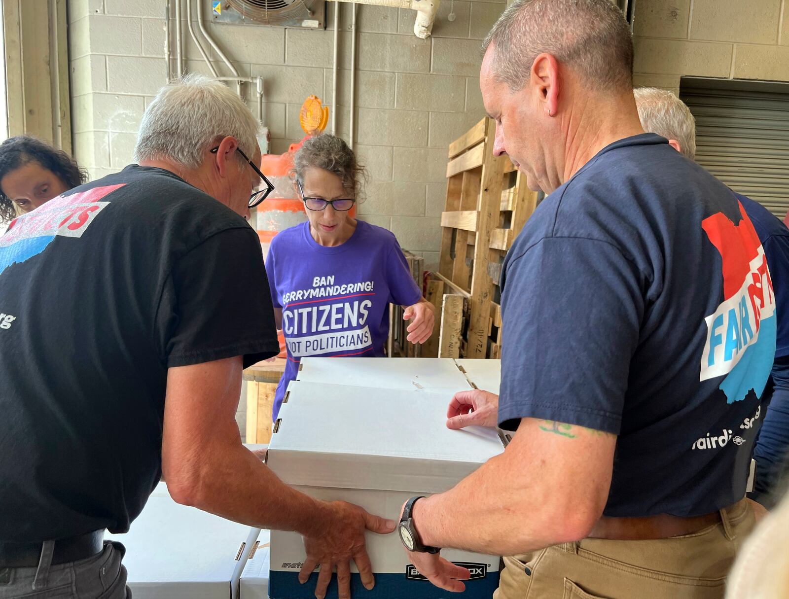 Volunteers with Citizens Not Politicians load boxes of signed petitions to Secretary of State Frank LaRose's office on Monday, July 1, 2024, in Columbus, Ohio. Backers of a proposal to change Ohio's troubled political mapmaking system delivered hundreds of thousands of signatures on Monday as they work to qualify for the statewide ballot this fall. (AP Photo/Patrick Orsagos)