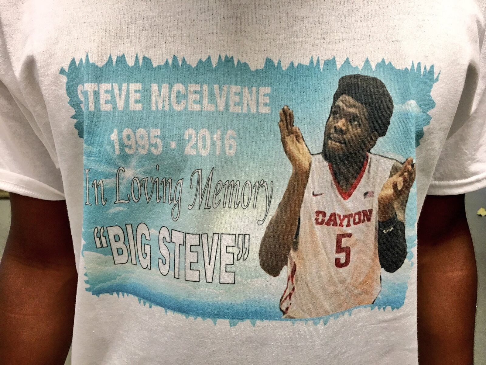 Family and friends of Steve McElvene wore T-shirts with his image Friday, May 20, 2016, during his visitation. (David Jablonski/Staff)