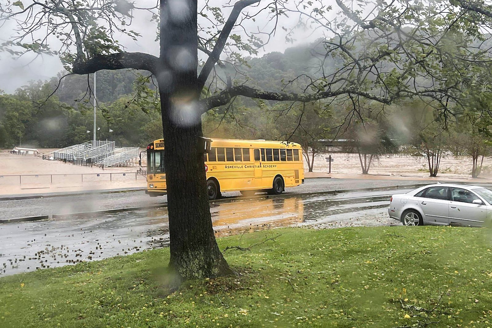 FILE - This photo provided by Kelly Benware shows flooding around the football field at Asheville Christian Academy in Swannanoa, N.C., on Friday, Sept. 27, 2024. (Kelly Benware via AP, File)