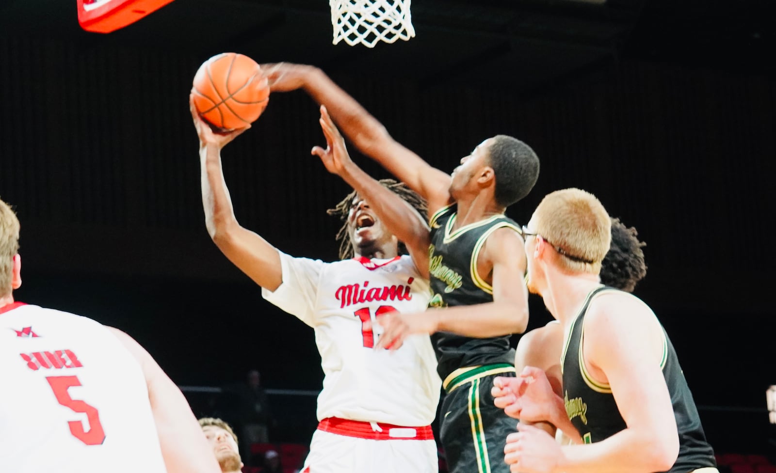 Miami's Antwone Woolfolk goes up to the rim against Bethany on Sunday afternoon at Millett Hall. Chris Vogt/CONTRIBUTED