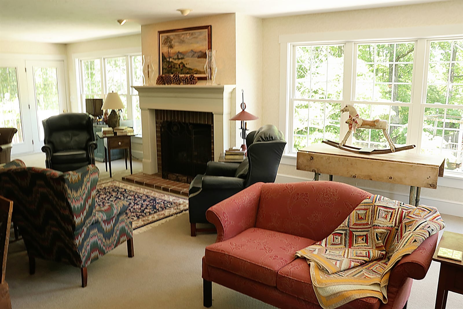 Off the kitchen is the great room addition where 12 windows flank a brick, gas fireplace and provide panoramic views of the island and river. CONTRIBUTED PHOTO BY KATHY TYLER