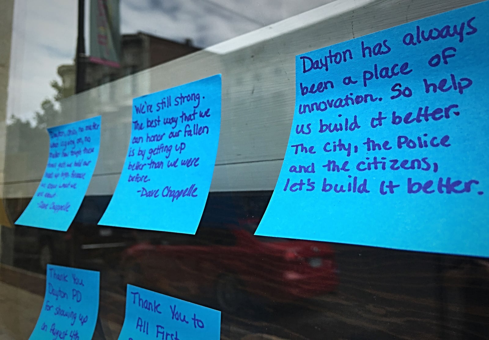 Post-it notes on the windows of businesses in the Oregon District Monday, Aug. 3, 2020.