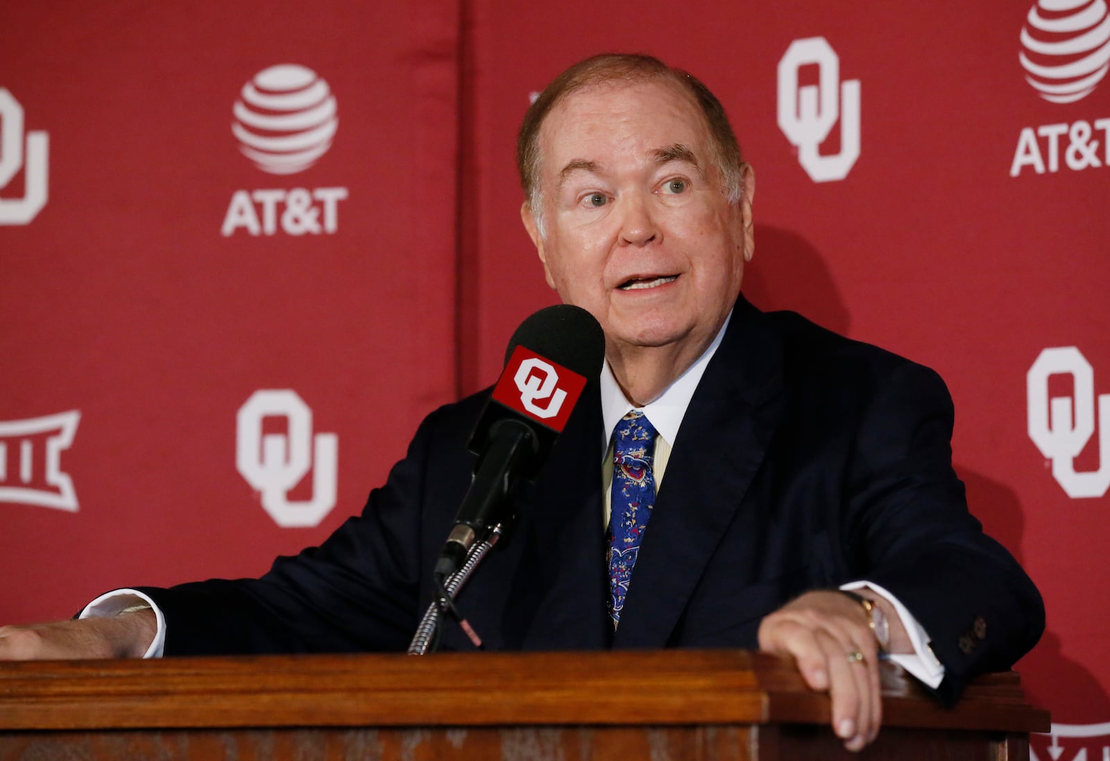 FILE - David Boren, president of the University of Oklahoma, speaks at a news conference to announce the retirement of Oklahoma head football coach Bob Stoops in Norman, Okla., Wednesday, June 7, 2017. (AP Photo/Sue Ogrocki)