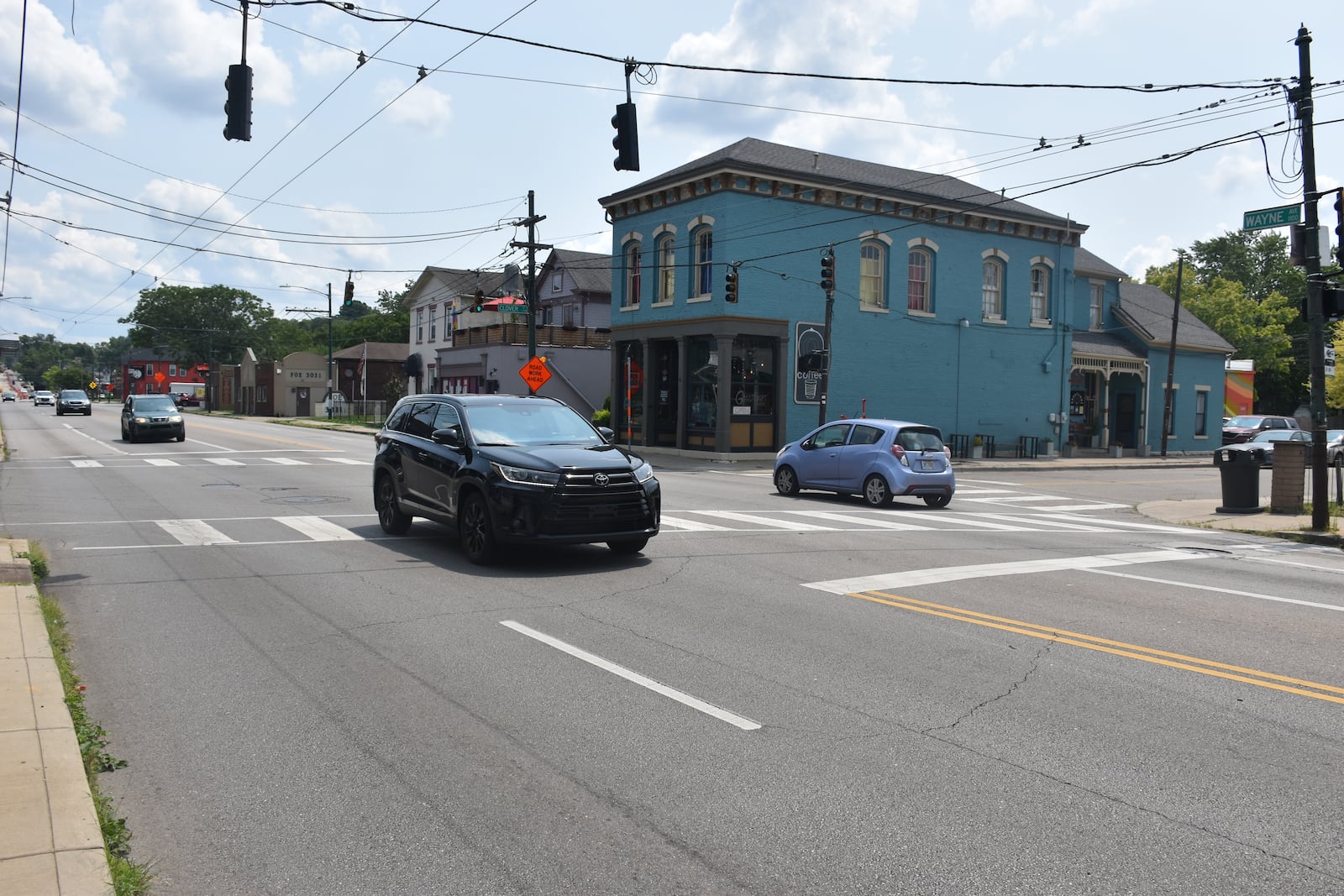 A couple of kids were struck by an SUV at the intersection of Wayne Avenue and Clover Street in southeast Dayton on Monday, July 22, 2024. Vehicles often travel at high speeds through that intersection. CORNELIUS FROLIK / STAFF