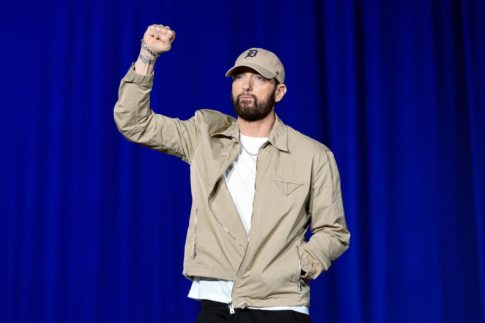 FILE - Rapper Eminem appears at a campaign rally supporting Democratic presidential nominee Vice President Kamala Harris in Detroit on Oct. 22, 2024. (AP Photo/Paul Sancya, File)