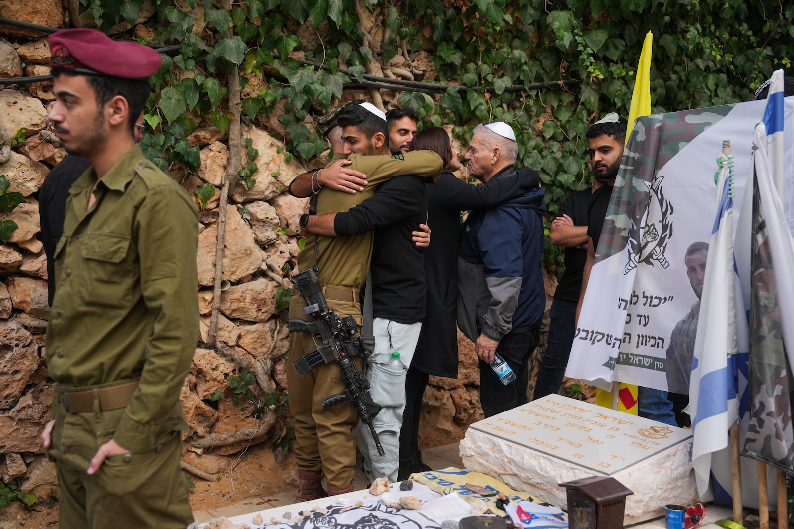 Mourners attend the funeral of Israeli soldier Orr Katz, who was killed in a battle in the Gaza Strip, at the Mount Herzl military cemetery in Jerusalem, Tuesday, Nov. 12, 2024. (AP Photo/Ohad Zwigenberg)