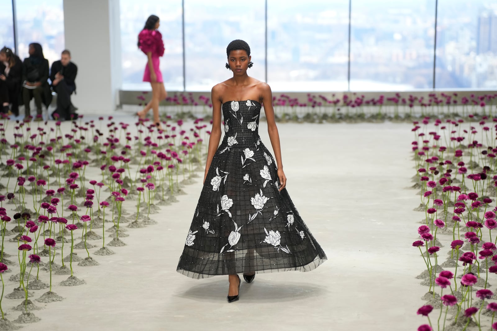 Models walk the runway during the Carolina Herrera Fall/Winter 2025 fashion show as part of New York Fashion Week on Monday, Feb. 10, 2025, in New York. (Photo by Charles Sykes/Invision/AP)