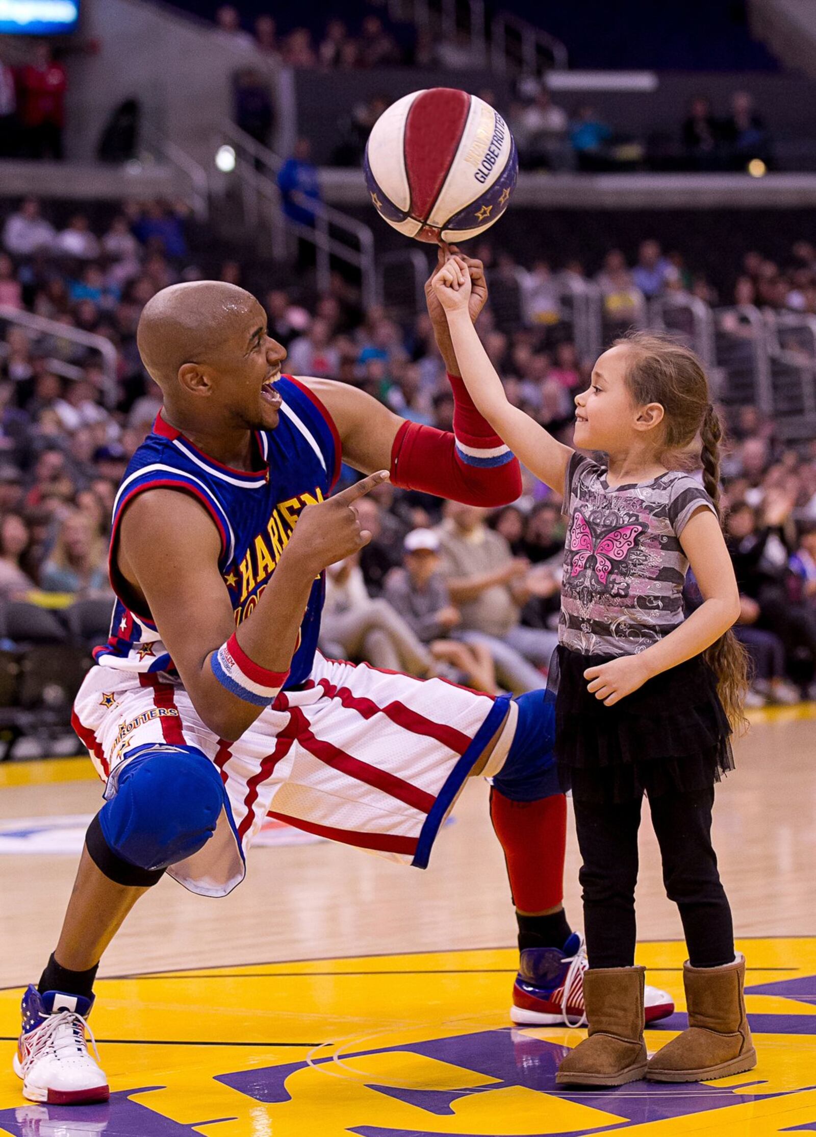 Scooter Christensen and his teammates from the Harlem Globetrotters, currently on its 90th anniversary tour, return to town for its annual New Year’s Eve game at the Nutter Center in Fairborn on Thursday, Dec. 31. CONTRIBUTED