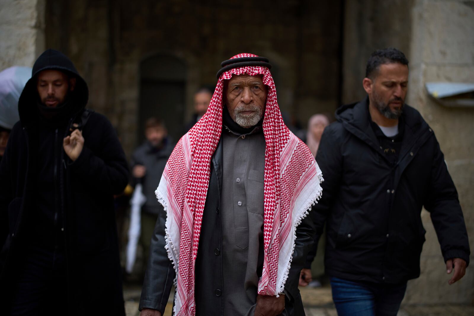 A Muslim worshipper makes his way to the Al-Aqsa Mosque compound for the Friday prayers of the Muslim holy month of Ramadan in the Old City of Jerusalem, Friday, March 7, 2025. (AP Photo/Leo Correa)