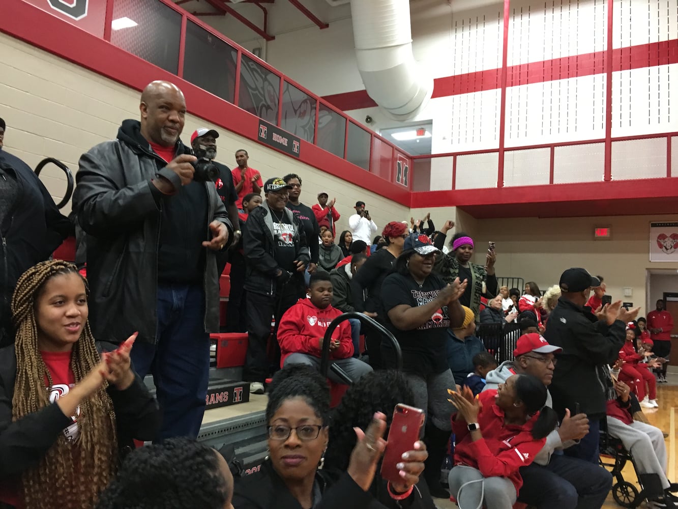 PHOTOS: Trotwood parents and fans welcome home football state champs at victory celebration