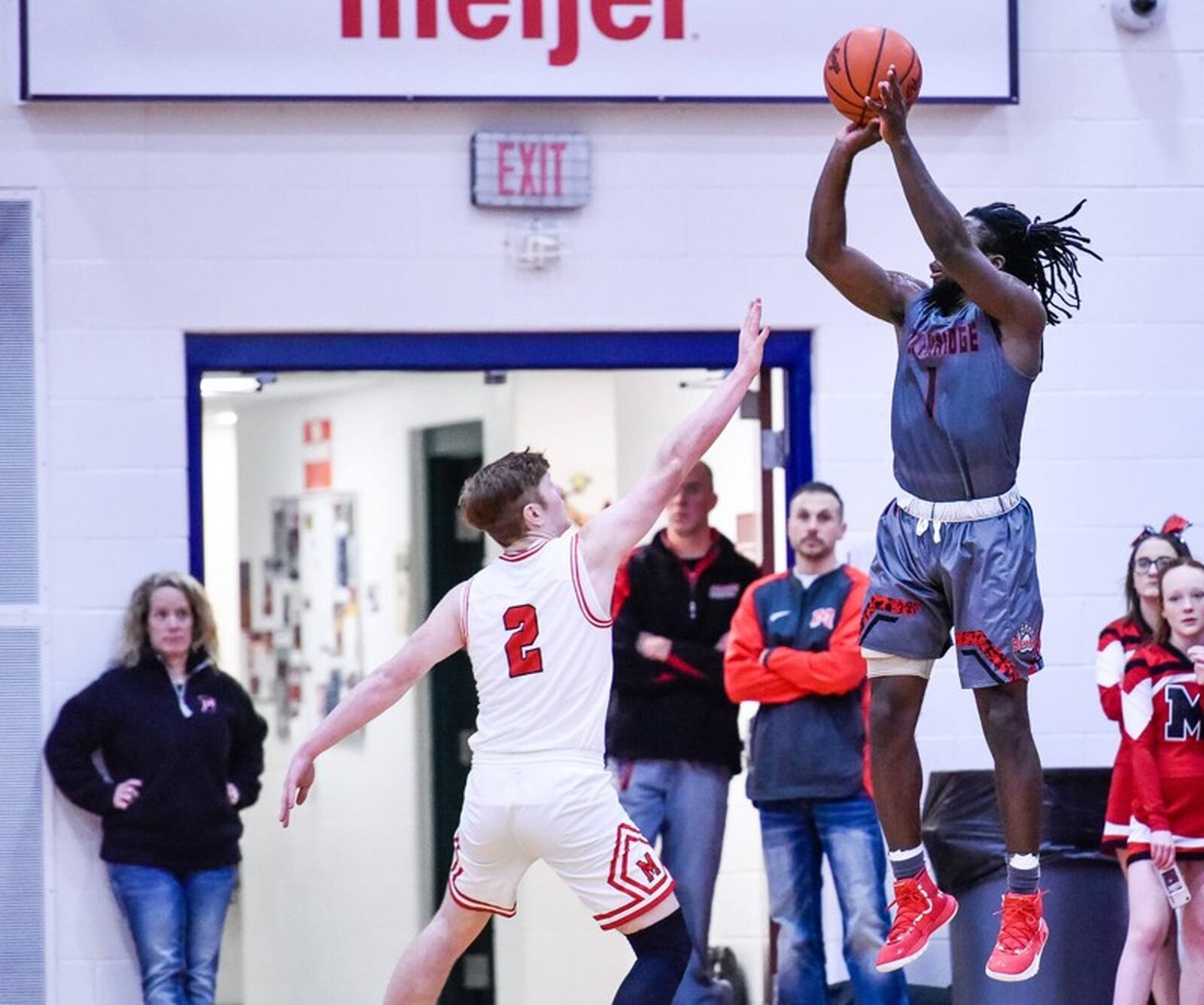 A three-year starter and leading scorer, Northridge senior Twon Hines (shooting) hit the winning 3-pointer in a 58-56 win at Middletown Madison on Friday, Feb. 8, 2019. NICK GRAHAM / STAFF