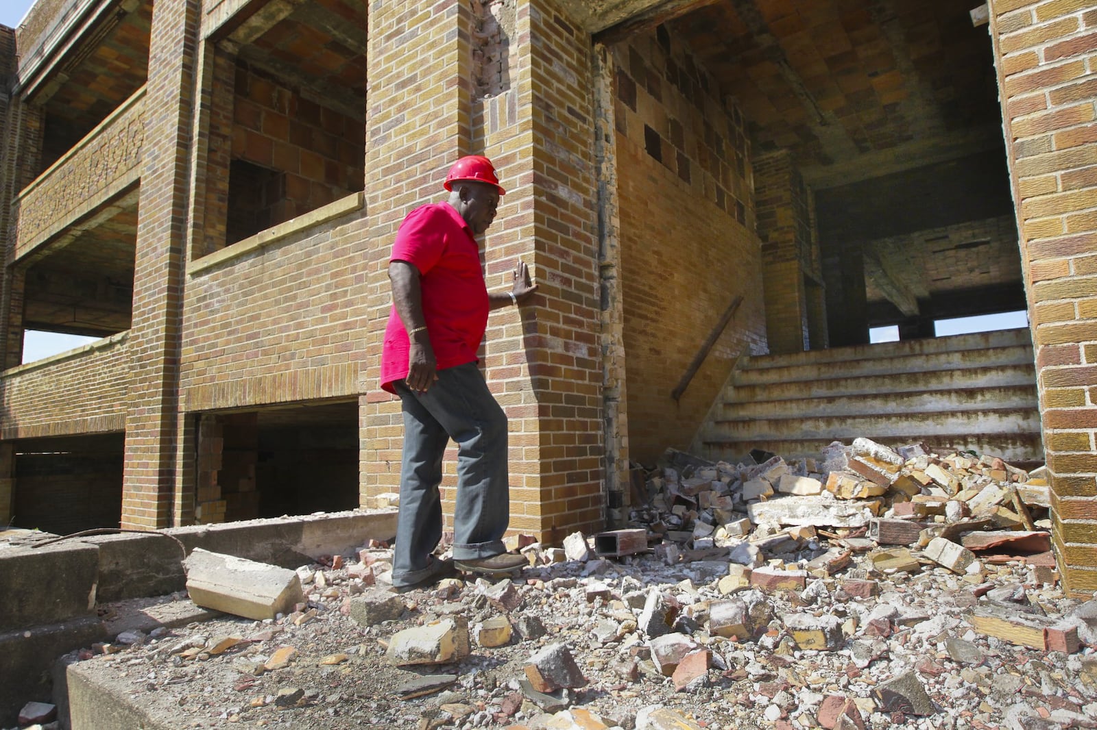 In this photo from 2012, James Cameron, then a subcontractor for Steve Rauch, Inc., surveys the soon-to-be demolished Jefferson High School building for salvage. A Demolition Day Ceremony is scheduled for Saturday September 1st, 2012. Opening ceremonies will begin at 9:00am with a final walkthrough of the site. Staff photo by Jim Witmer