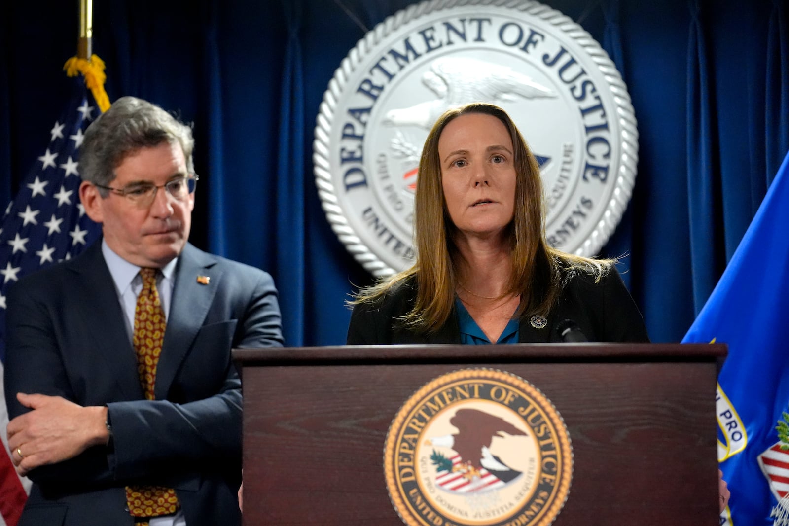 Special Agent in Charge FBI, Boston Division Jodi Cohen, right, speaks to reporters as U.S. Attorney District of Massachusetts Joshua Levy, left, looks on during a news conference, Monday, Dec. 16, 2024, at the federal courthouse, in Boston. (AP Photo/Steven Senne)