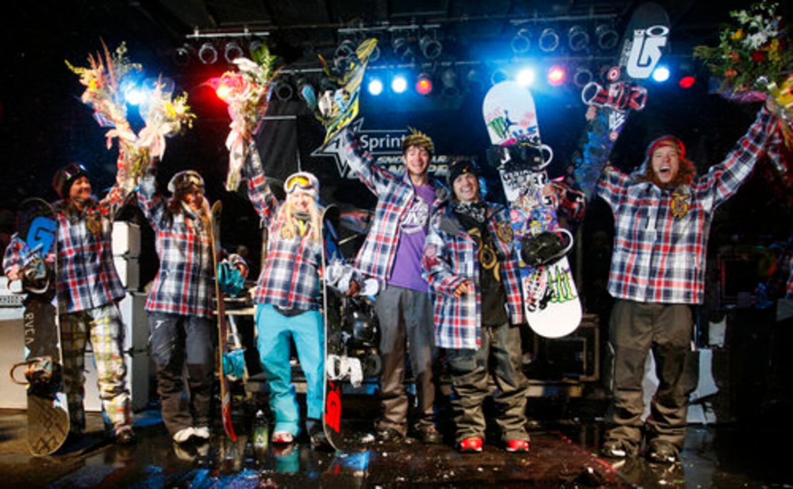 The U.S. Snowboard Olympic Team from left: Kelly Clark, Gretchen Bleiler, Hannah Teter, Scott Lago, Louie Vito, and Shaun White celebrate after they were announced after the conclusion of the U.S. Snowboarding Grand Prix finals, Saturday, Jan. 23, 2010, in Park City, Utah.