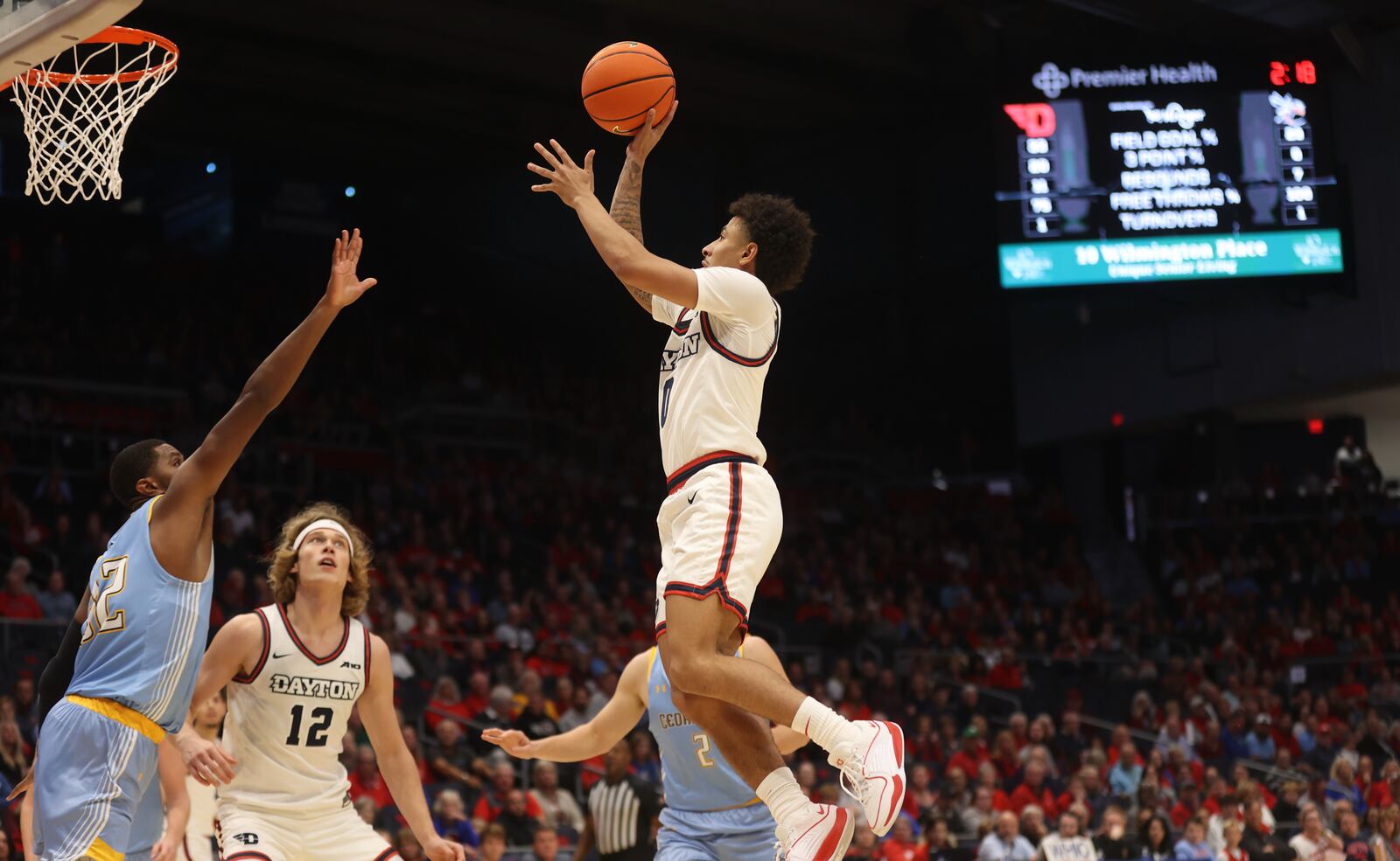 Dayton's Javon Bennett shoots against Cedarville in an exhibition game on Saturday, Oct. 28, 2023, at UD Arena. David Jablonski/Staff