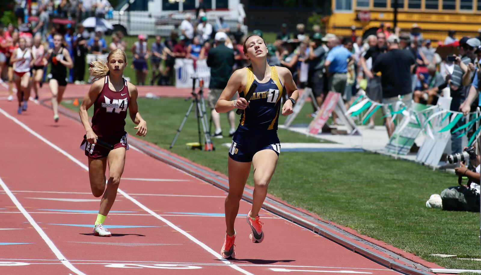 Oakwood's Grace Hartman crosses teh finish line in the 4x800-meter relay on Friday, June 3, 2022, in the Division II state track and field championships at Jesse Owens Memorial Stadium in Columbus. Oakwood on the race for the second straight year. David Jablonski/Staff