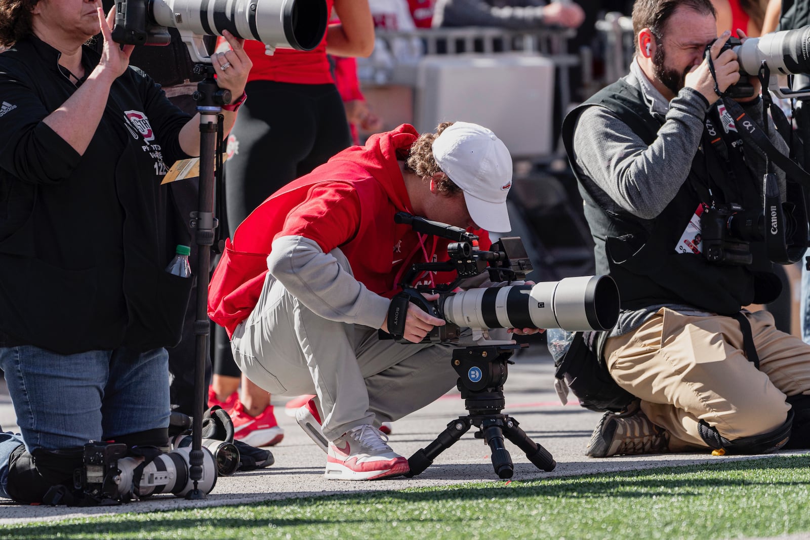 Michael Good shoots video of an Ohio State game at Ohio Stadium. Photo by Sam Mazzola