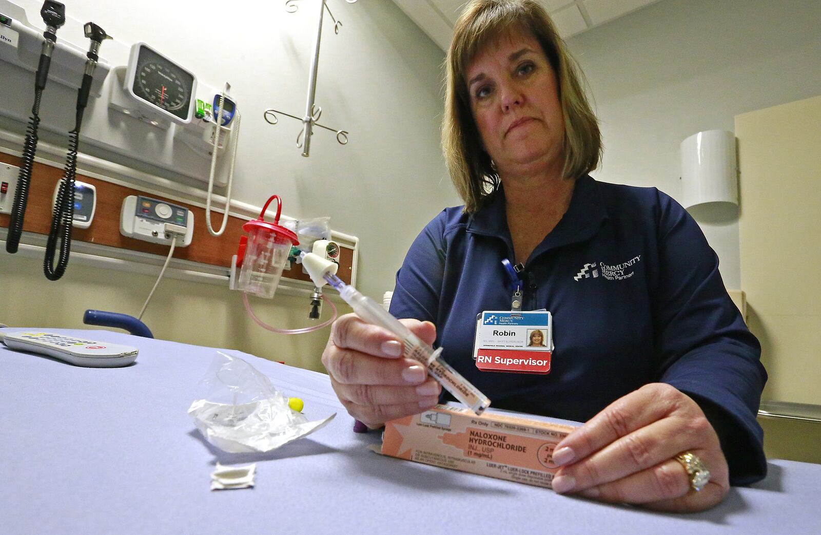 Robin Chadeayne, an RN supervisor in the Springfield Regional Medical Center Emergecy Department, says administering Narcan for a drug overdose has become a common occurance. Bill Lackey/Staff