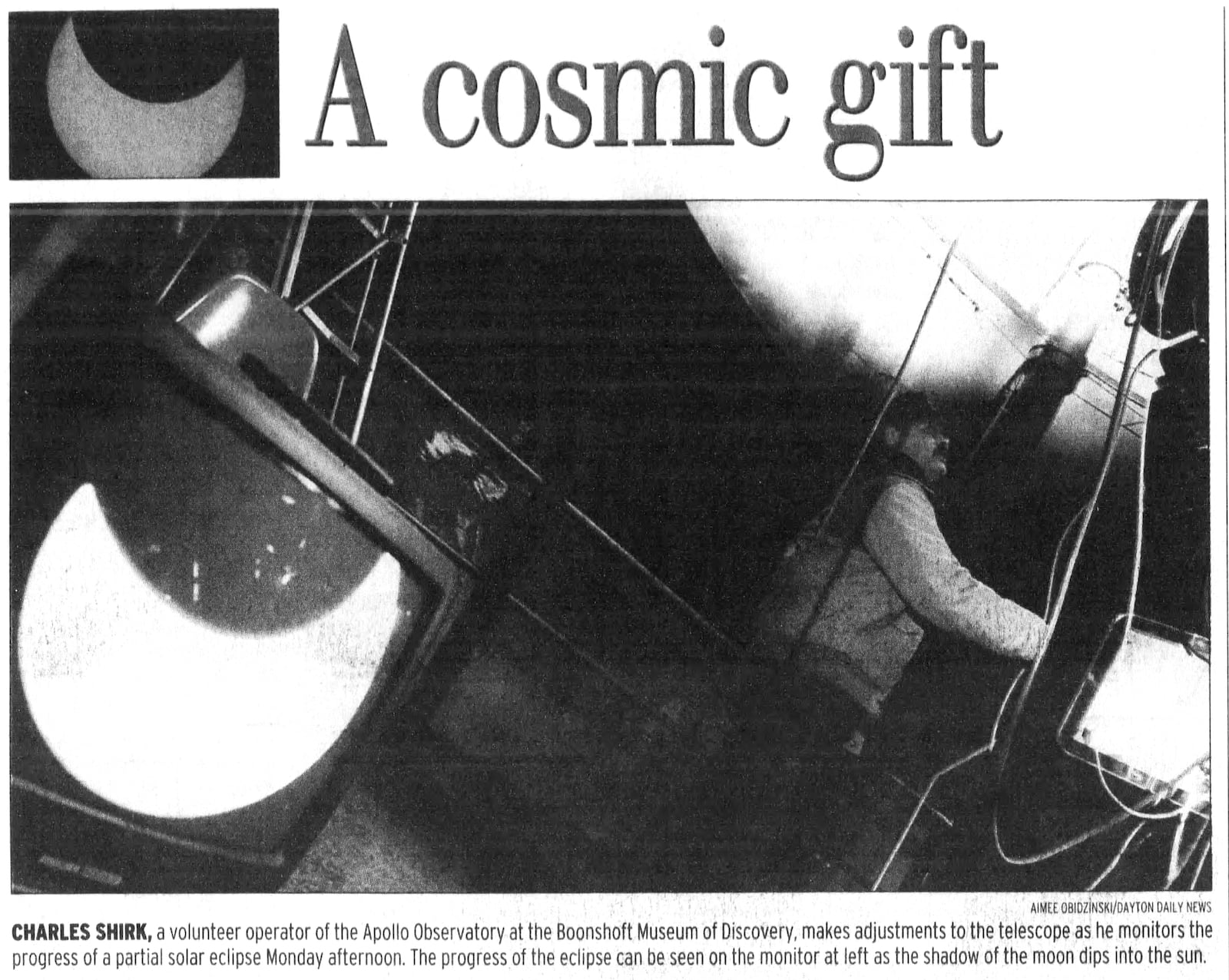 Charles Shirk, a volunteer operator of the Apollo Observatory at the Boonshoft Museum of Discovery monitors the partial solar eclipse in 2000. DAYTON DAILY NEWS ARCHIVES