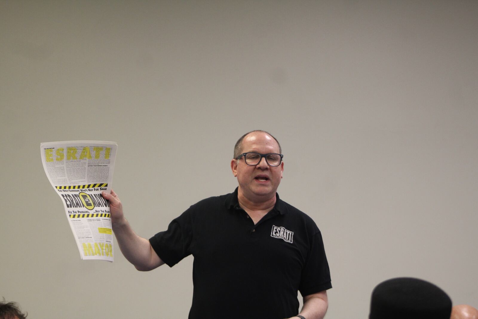 David Esrati, a Dayton city commission candidate, speaks at a candidate forum hosted by the Dayton Unit NAACP. CORNELIUS FROLIK / STAFF