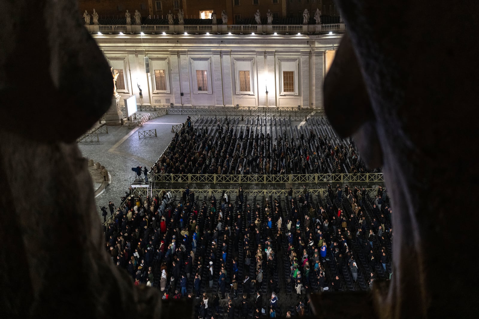 Catholic faithful attend a nightly rosary prayer service for the health of Pope Francis in St. Peter's Square at the Vatican. (AP Photo/Mosa'ab Elshamy)