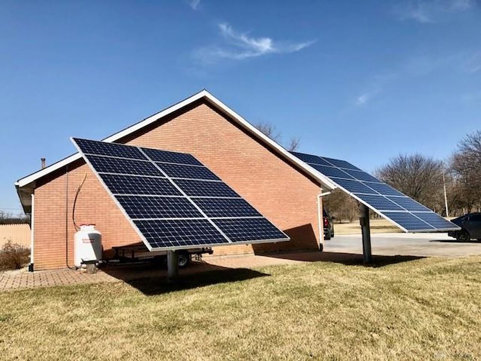 The all-electric brick ranch is powered by dual solar panels with a new inverter.