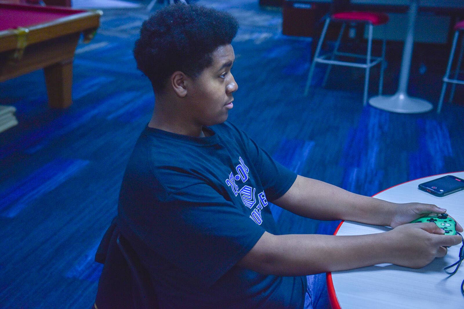 Jamari Jones takes part in his gaming hobby April 29 at Prairies Youth Center near Wright-Patterson Air Force Base. U.S. AIR FORCE PHOTO/SENIOR AIRMAN JACK GARDNER