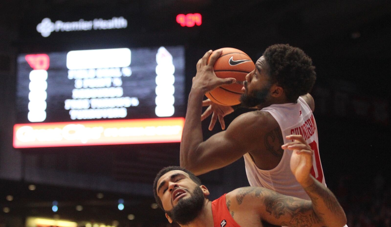 Dayton’s Josh Cunningham catches a lob pass and scores at the buzzer to give the Flyers a victory against Ball State on Friday, Nov. 10, 2017, at UD Arena.