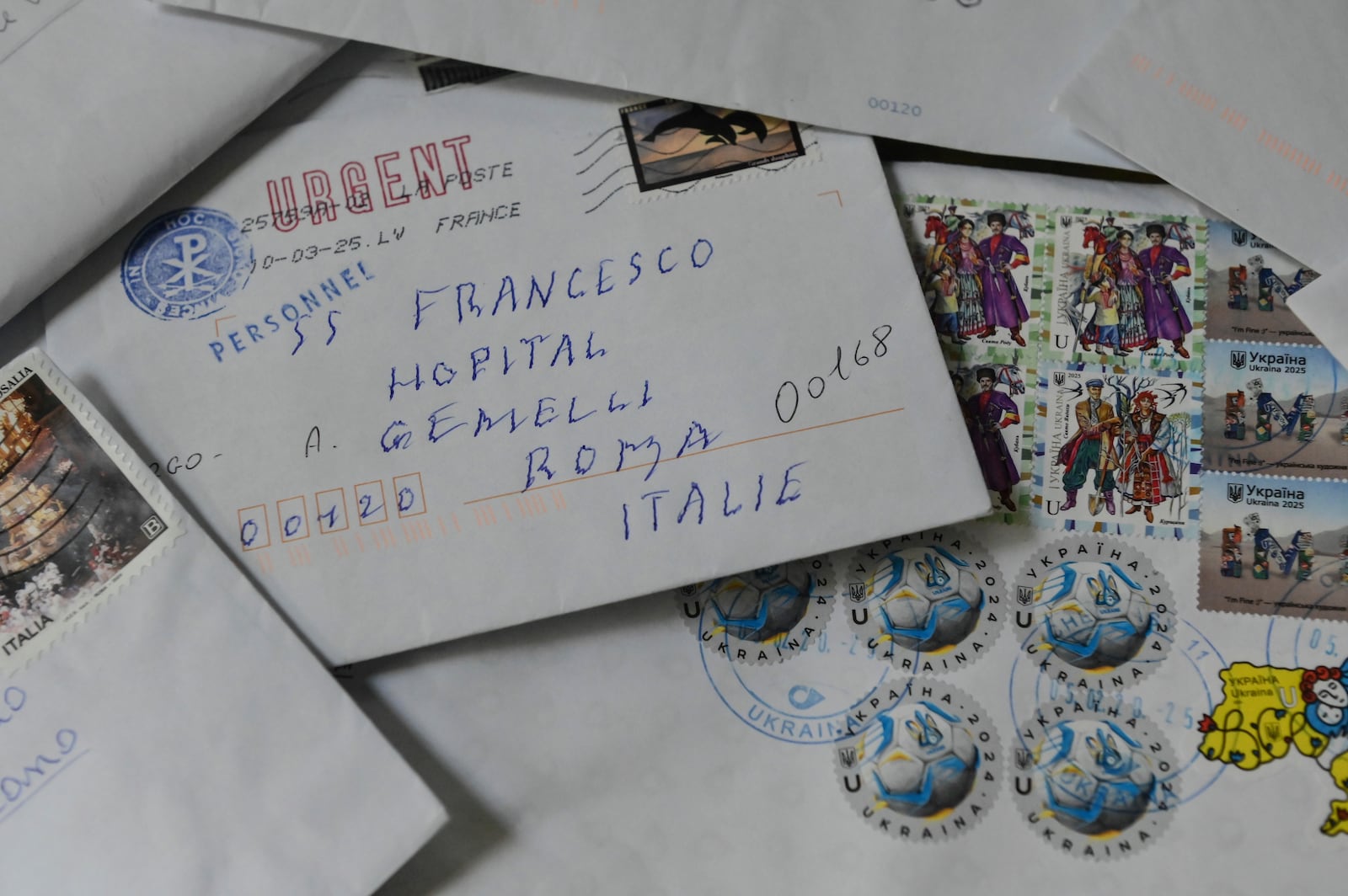 Letters addressed to Pope Francis are seen at Leonardo da Vinci International Airport's postal sorting center in Fiumicino some 30 kilometers south-west of Rome, Wednesday, March 19, 2025. (AP Photo/Chris Warde-Jones)