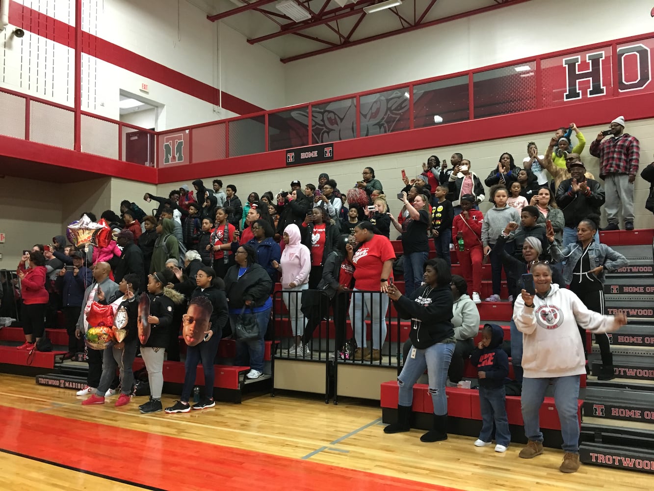 PHOTOS: Trotwood parents and fans welcome home football state champs at victory celebration