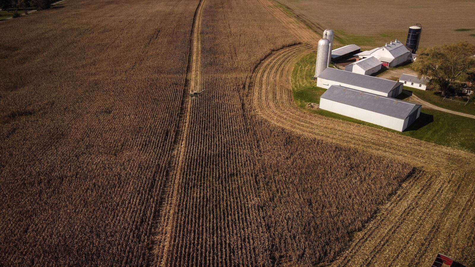 A farmer harvests crops on his land in western Montgomery County. The value of farmland that uses state tax savings programs is expected to jump 78% on average locally. JIM NOELKER/STAFF