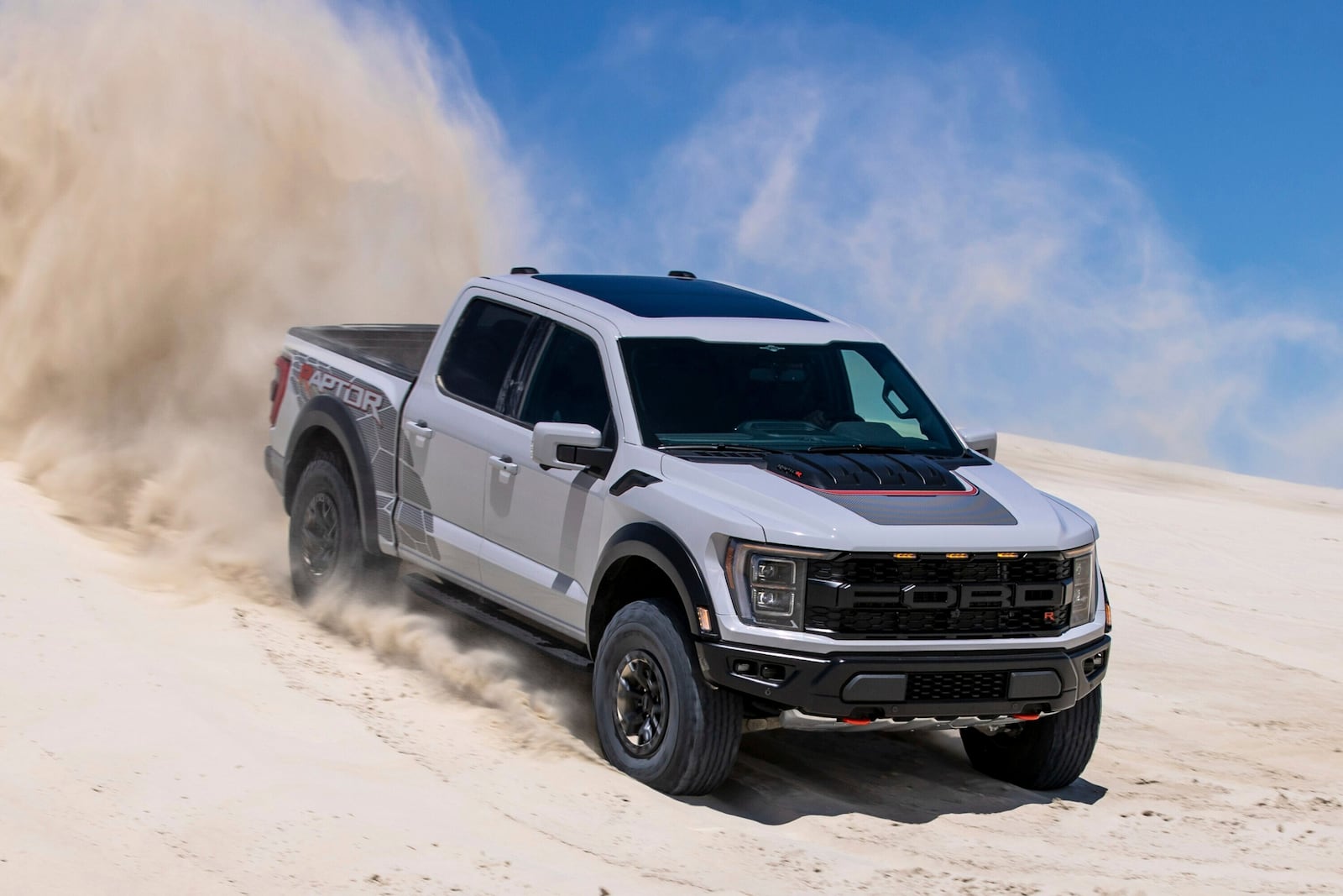 This photo provided by Ford shows the 2025 F-150 Raptor R. The Raptor R has a V8 engine and a specialized suspension that helps it stay in control when driving off-road at high speed. (Courtesy of Ford Motor Co. via AP)