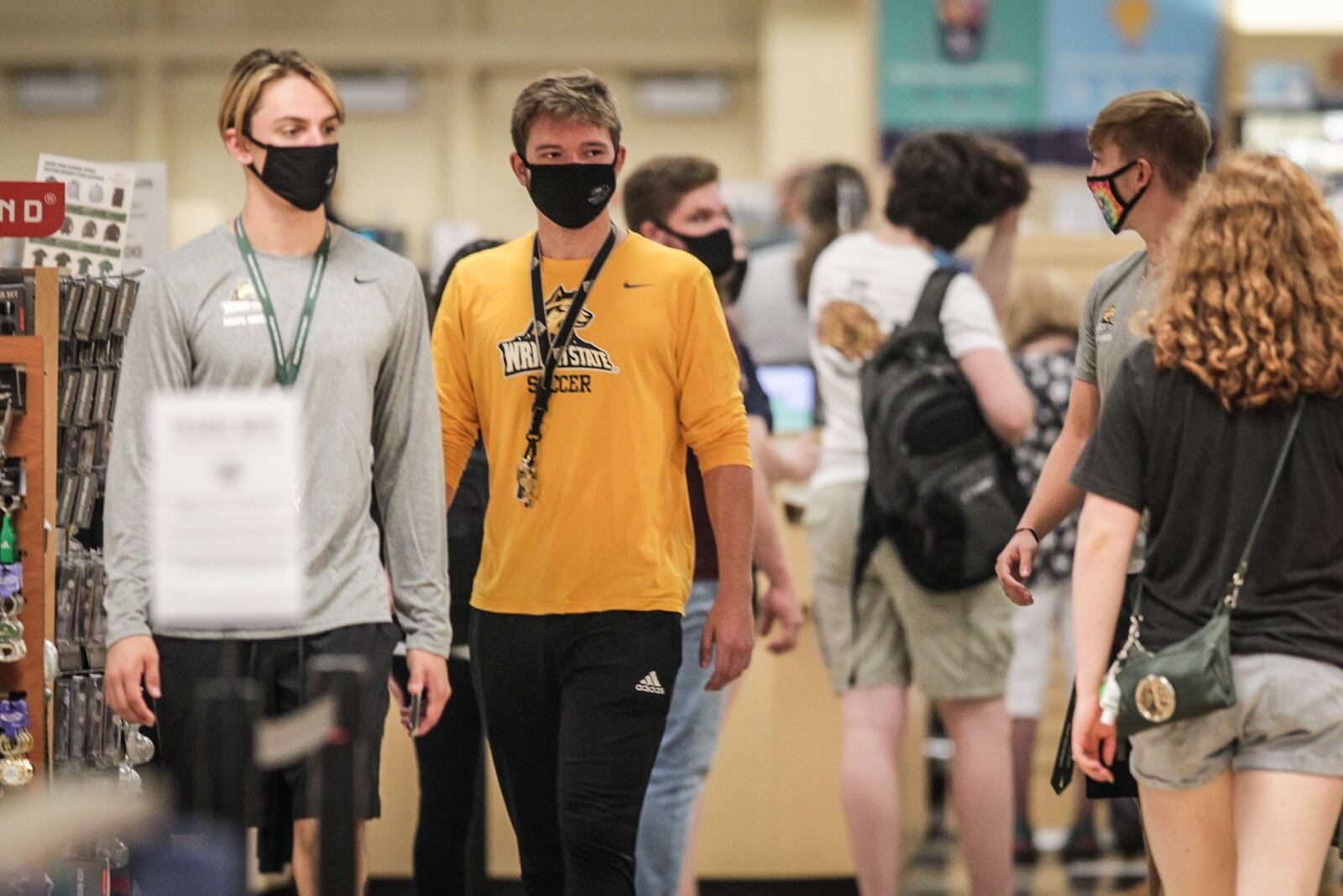 Wright State University student, in limited numbers, returned to class Monday August 24, 2020. There were students lined up in the bookstore practicing social distancing and almost all students were wearing masks. JIM NOELKER/Staff