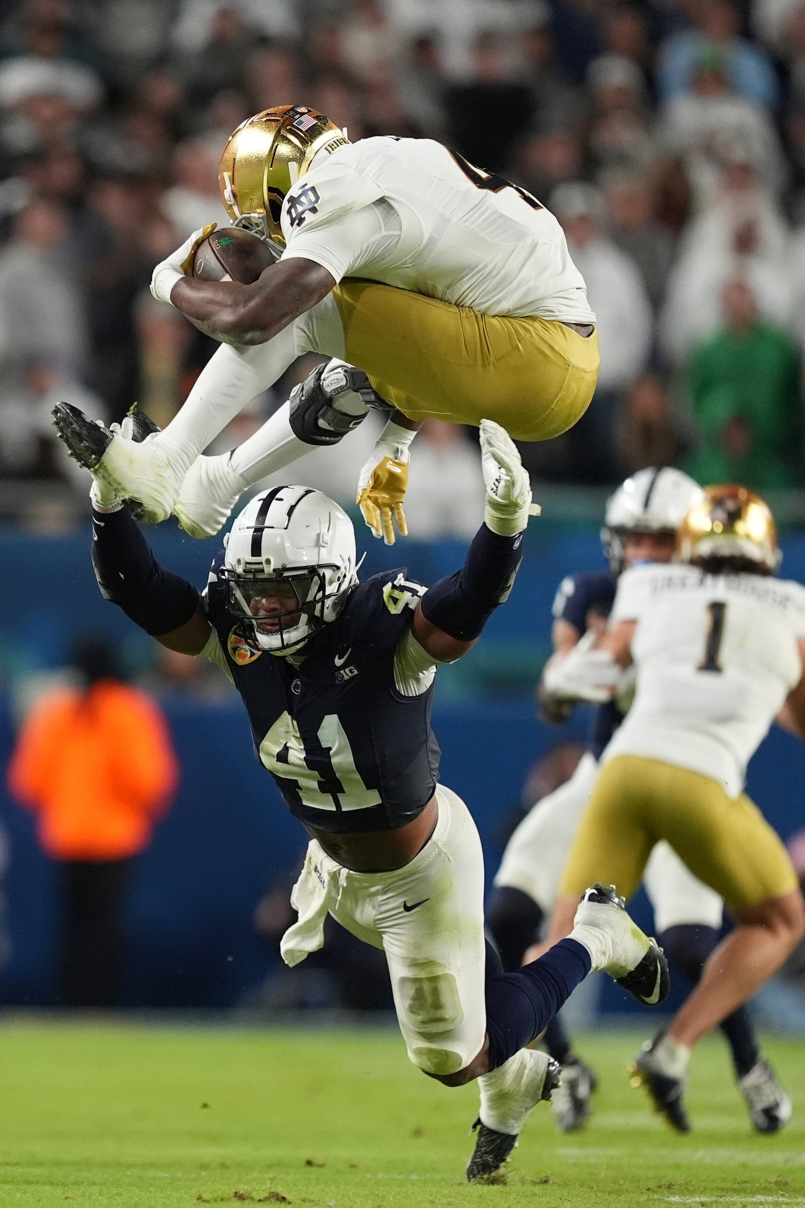 during the second half of the Orange Bowl College Football Playoff semifinal game, Thursday, Jan. 9, 2025, in Miami Gardens, Fla. (AP Photo/Rebecca Blackwell)