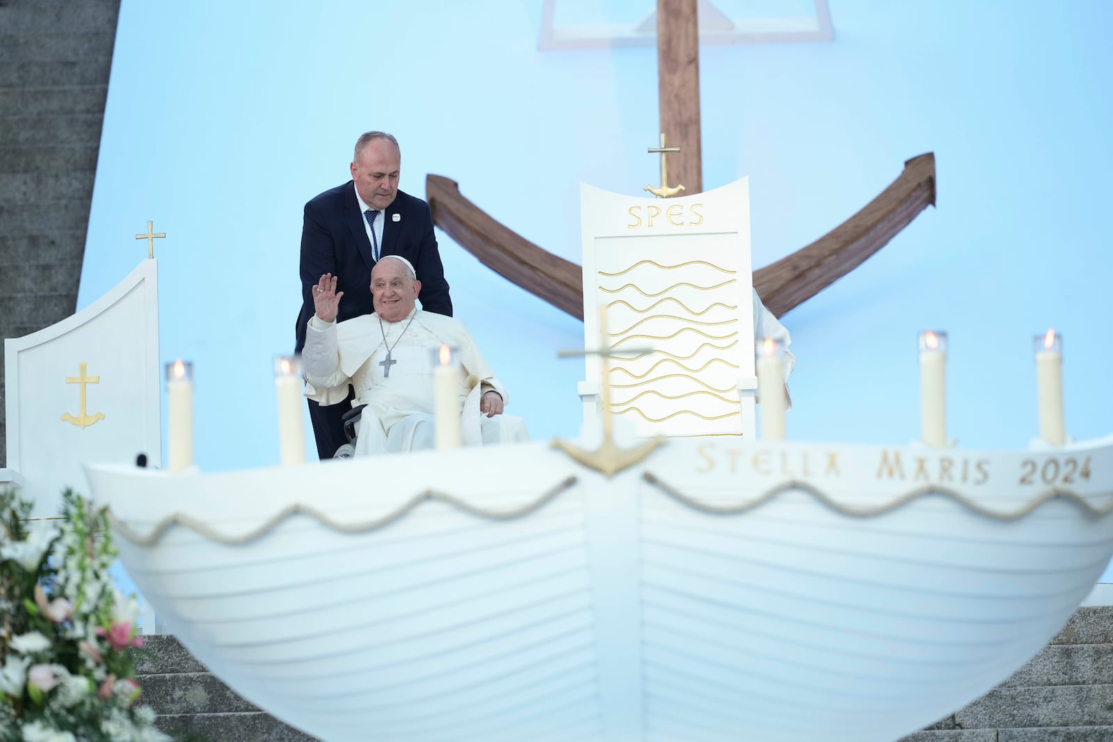 Pope Francis presides over a mass in Ajaccio "Place d'Austerlitz" during his visit in the French island of Corsica, Sunday, Dec. 15, 2024. (AP Photo/Alessandra Tarantino)