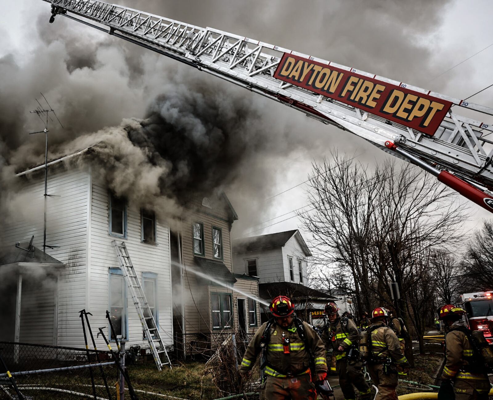 Crews ordered an emergency demolition of a vacant two-story house in the 100 block of South June Street in Dayton that was destroyed by fire Thursday afternoon, Feb. 16, 2023. JIM NOELKER/STAFF