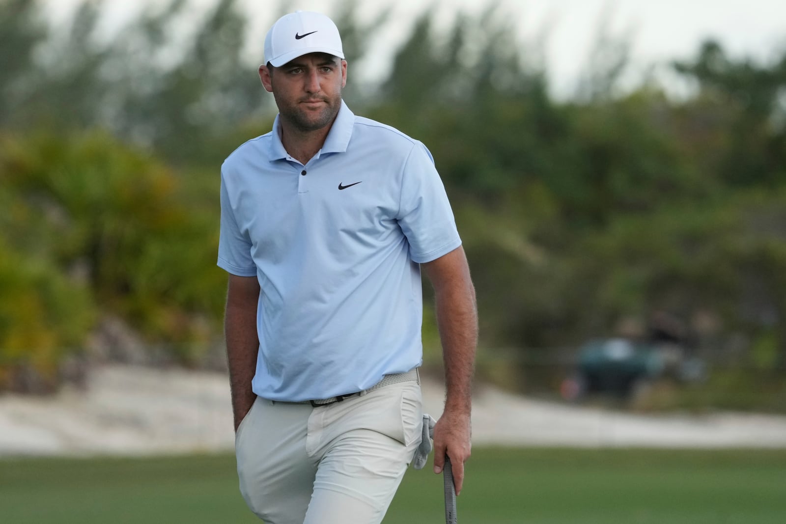 Scottie Scheffler, of the United States, reacts after missing a putt on the 18th hole during the third round of the Hero World Challenge PGA Tour at the Albany Golf Club, in New Providence, Bahamas, Saturday, Dec. 7, 2024. (AP Photo/Fernando Llano)