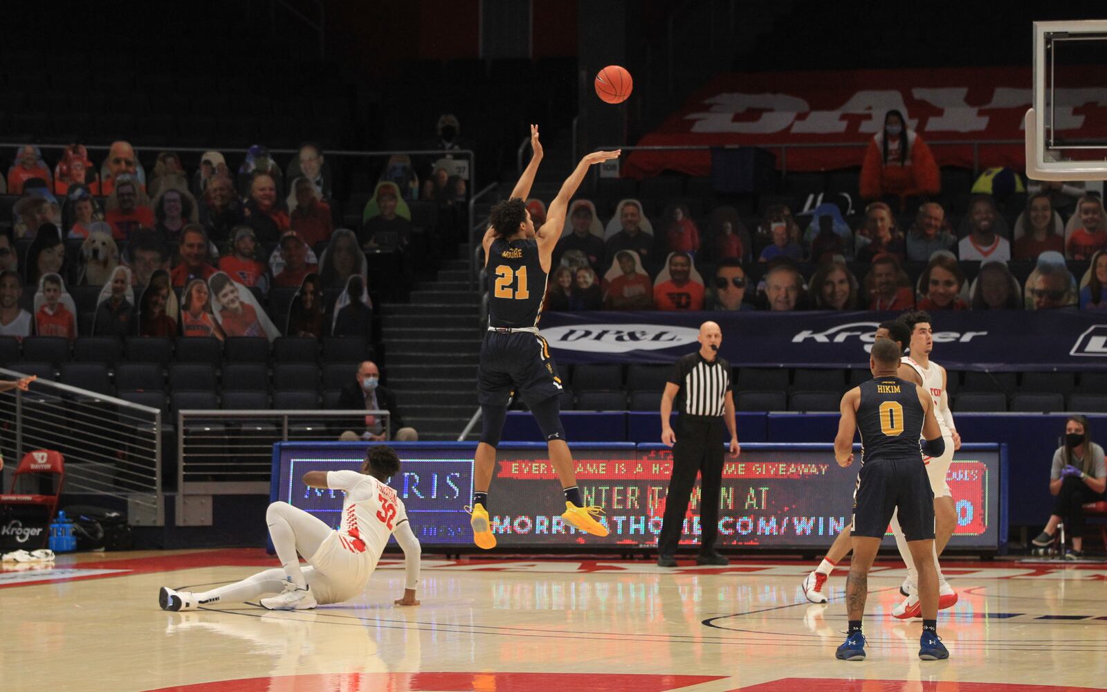 La Salle's Clifton Moore's makes a go-ahead shot with 2.5 seconds left against Dayton on Wednesday, Dec. 30, 2020, at UD Arena. David Jablonski/Staff