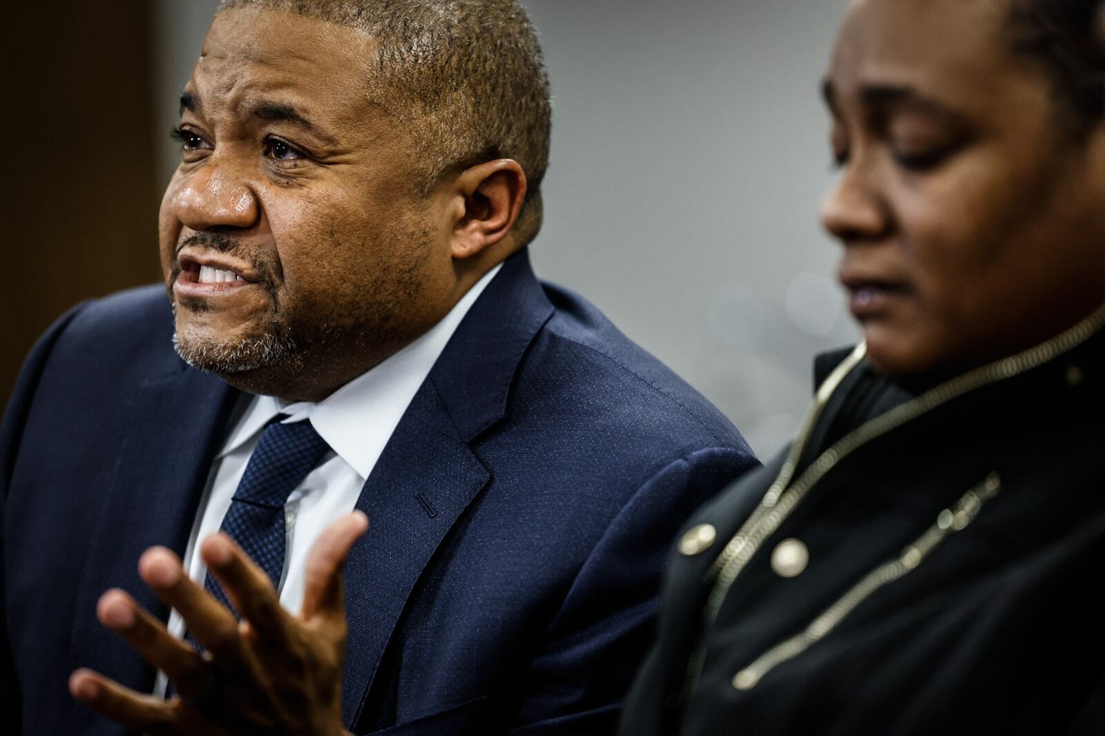 Attorney Michael Wright, left, talks to the media Wednesday January 18, 2023 at his office in downtown Dayton. Wright's client, Latinka Hancock believes she was assaulted by Butler Twp. police. JIM NOELKER/STAFF