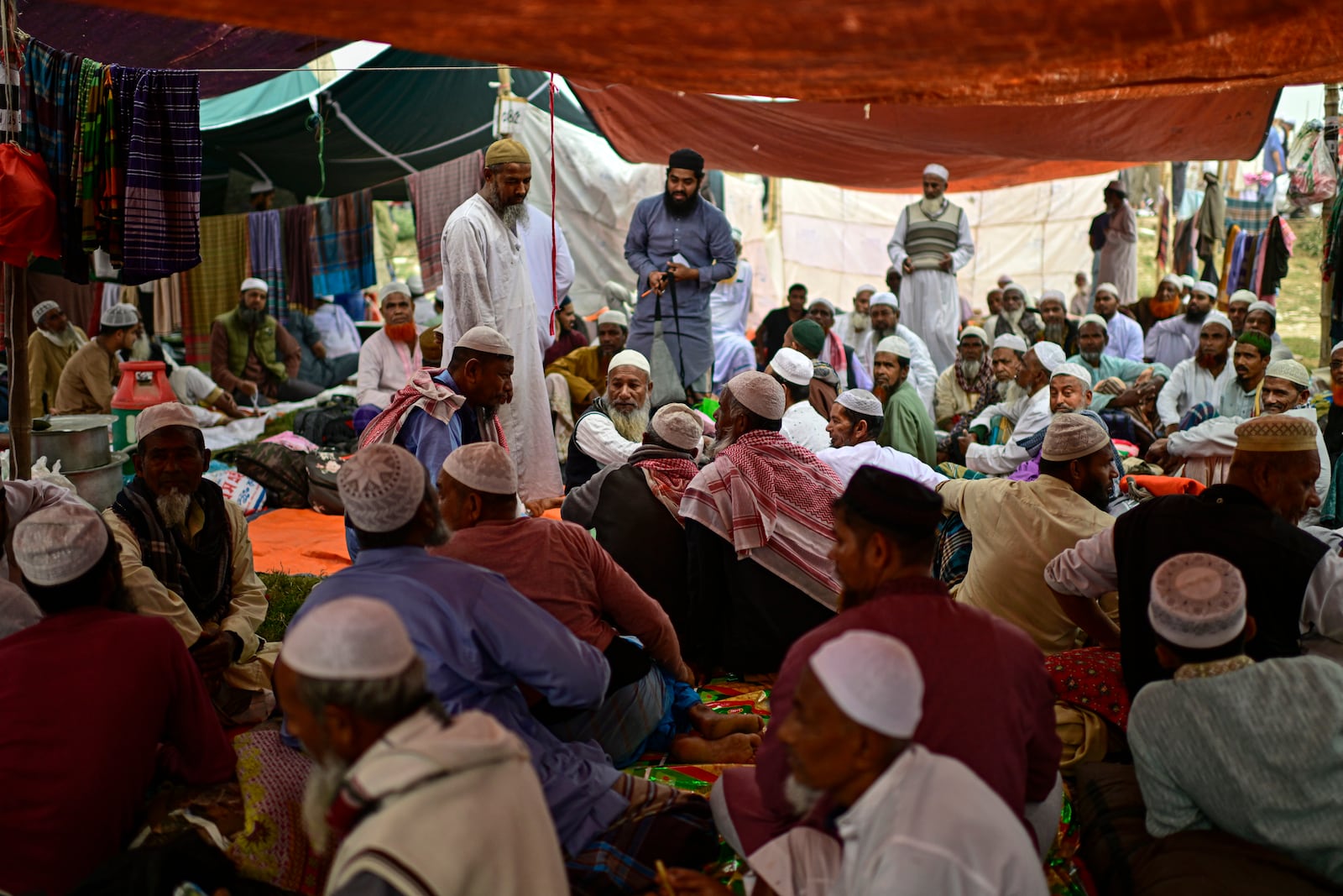 Muslim devotees rest under makeshift tents during the first phase of the three-day Biswa Ijtema, or the World Congregation of Muslims, at the banks of the Turag river in Tongi, near Dhaka, Bangladesh, Friday, Jan. 31, 2025. (AP Photo/Mahmud Hossain Opu)