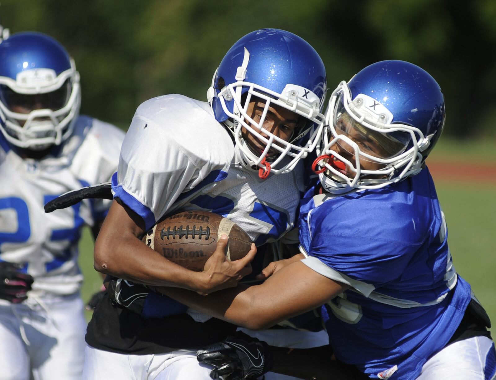 Dunbar football players participate in a preseason practice on Wednesday, Aug. 22, 2018. MARC PENDLETON / STAFF