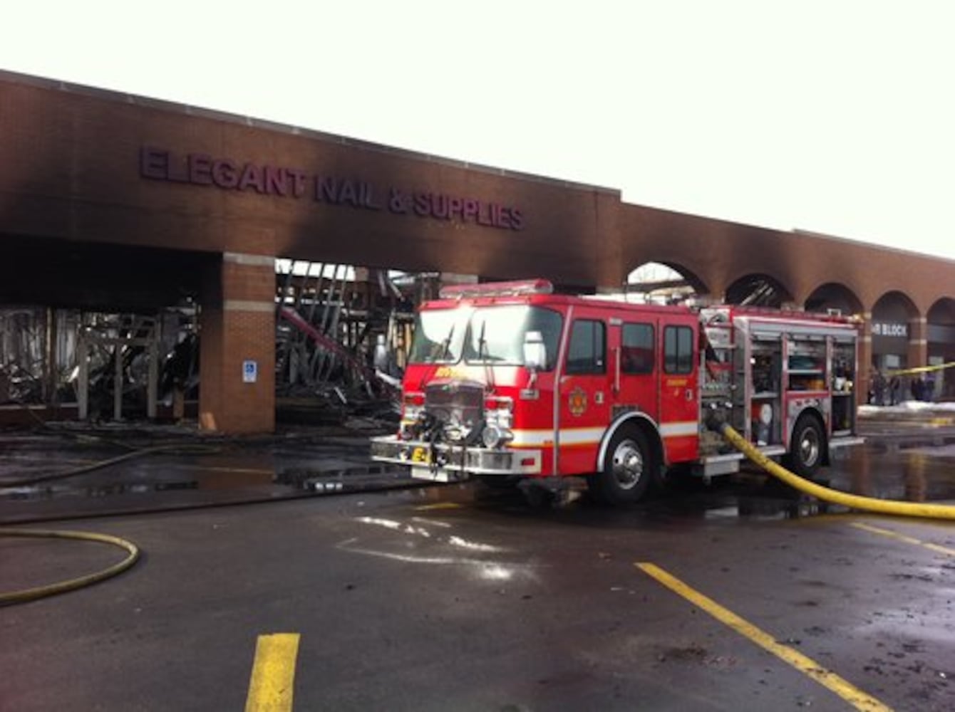 Page Manor shopping center damaged by fire