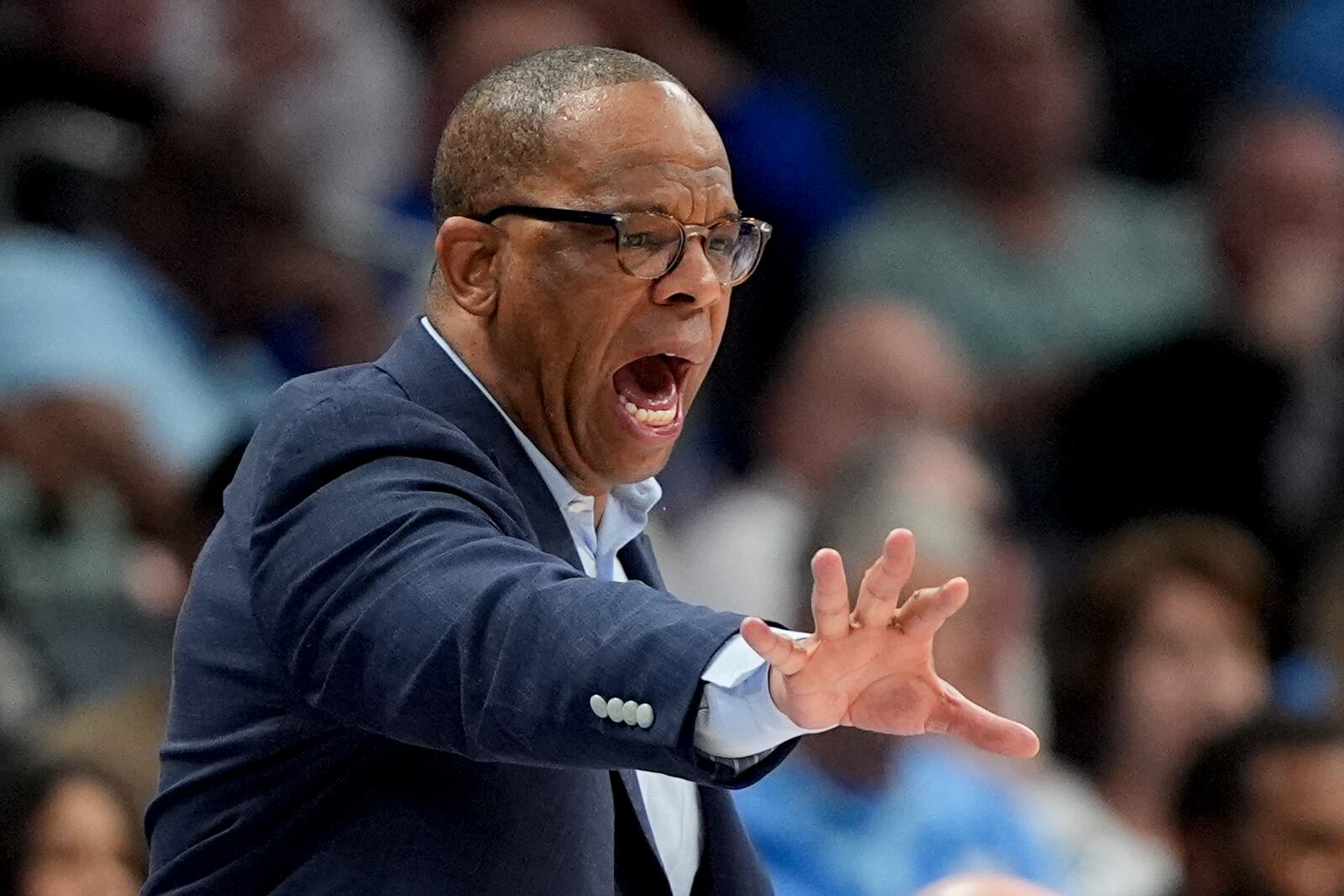 North Carolina head coach Hubert Davis yells during the first half of an NCAA college basketball game against Wake Forest in the quarterfinals of the Atlantic Coast Conference tournament, Thursday, March 13, 2025, in Charlotte, N.C. (AP Photo/Chris Carlson)