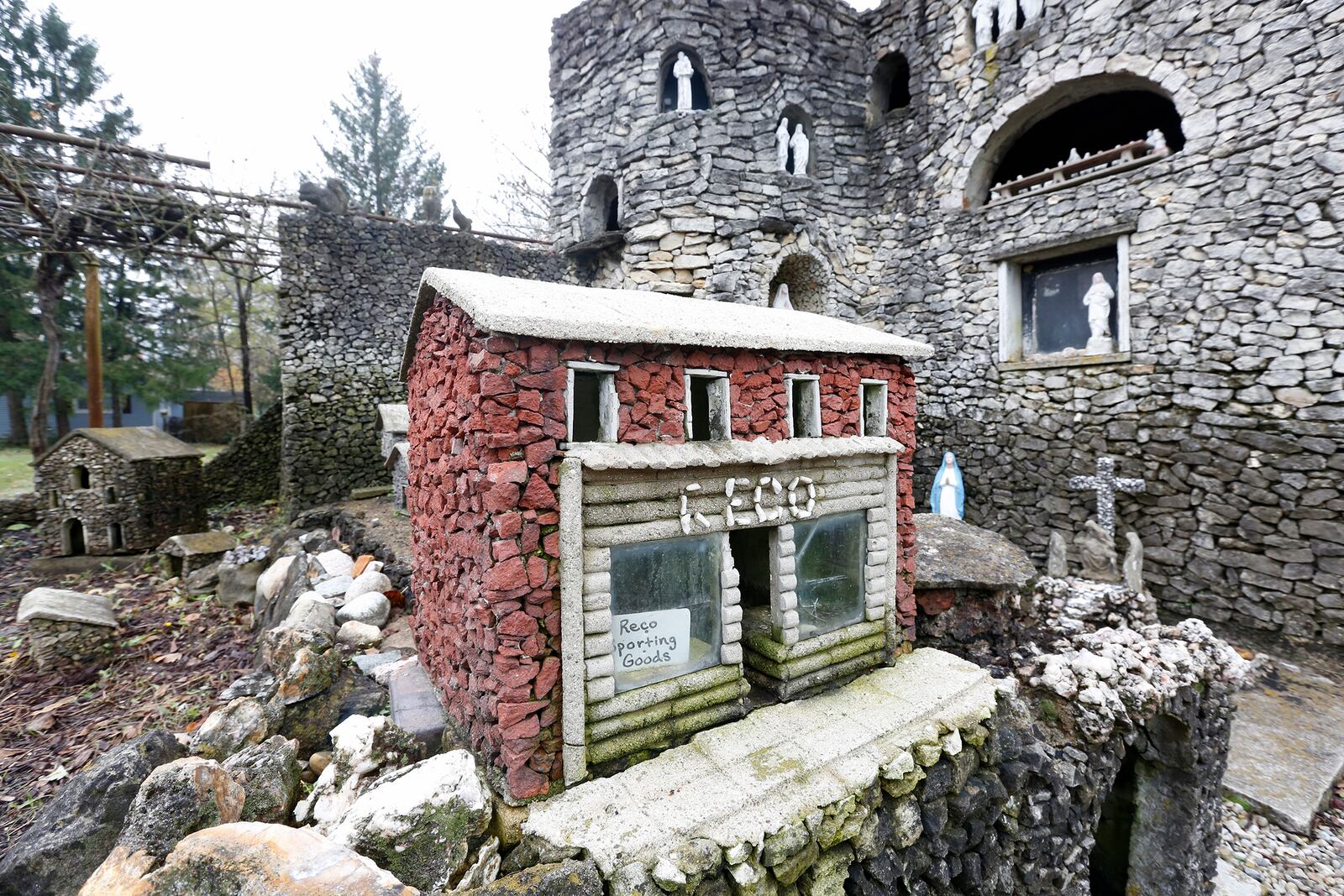 The Hartman Rock Garden, a folk art treasure located in Springfield, was built by Harry George "Ben" Hartman between 1932 and 1944. Hartman built a replica of Reco Sporting Goods,  the Sprinngfield store where he purchased fishing supplies.  LISA POWELL / STAFF