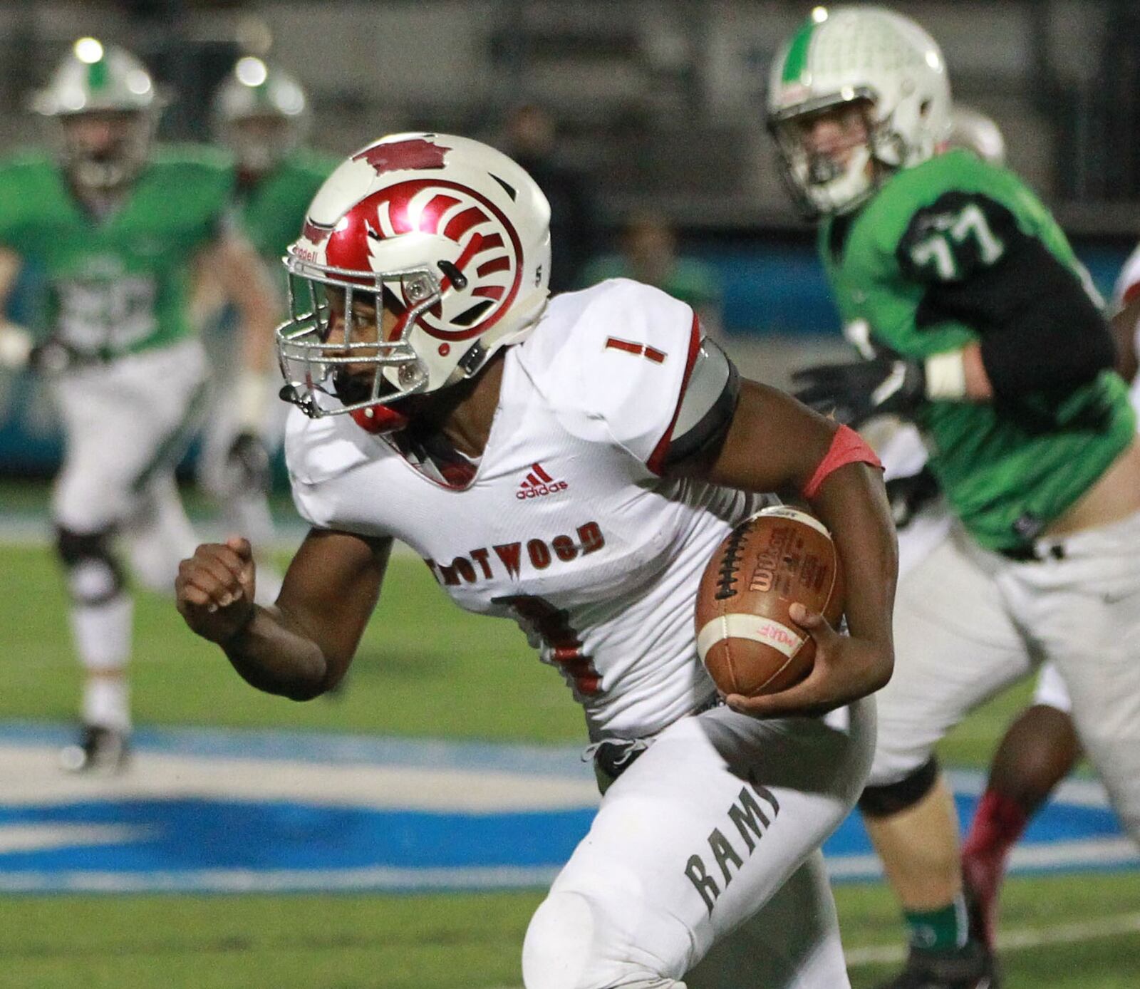 Trotwood QB Keon’tae Huguely takes off. Trotwood-Madison defeated Badin 20-7 in a D-III, Region 12 high school football final at Miamisburg on Friday, Nov. 22, 2019. MARC PENDLETON / STAFF